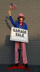 mannequin holding sign advertising robot for sale